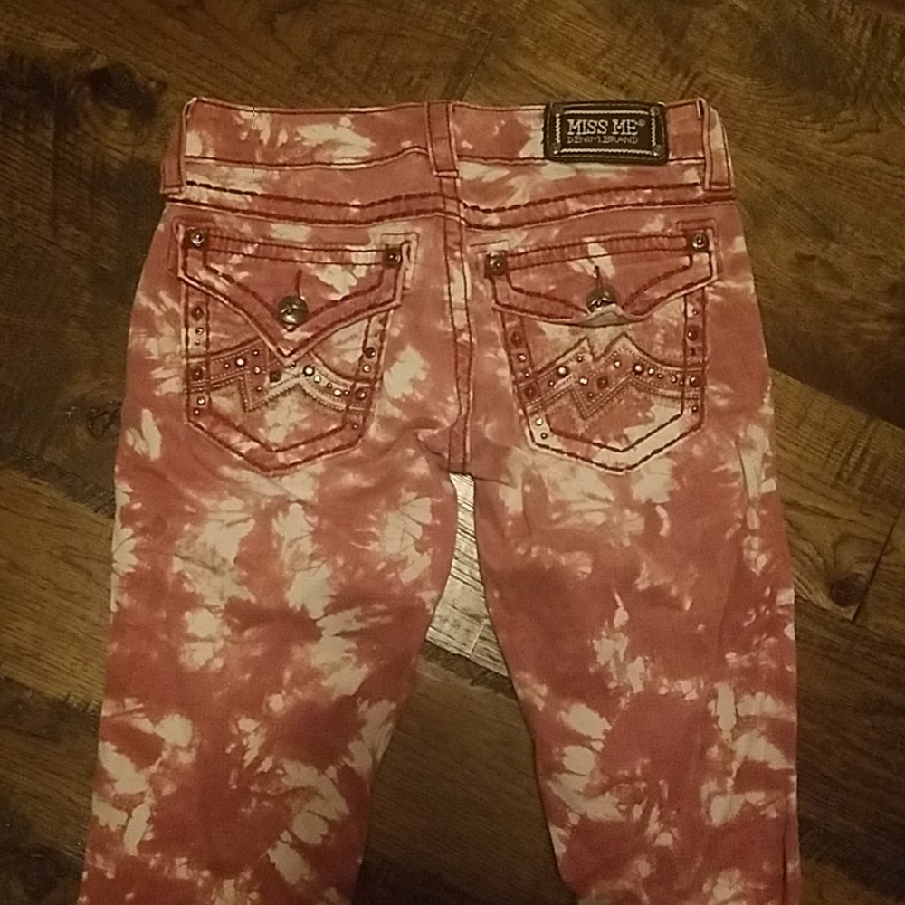 Size 26 miss me skinny Jeans red tie dye w/ bling